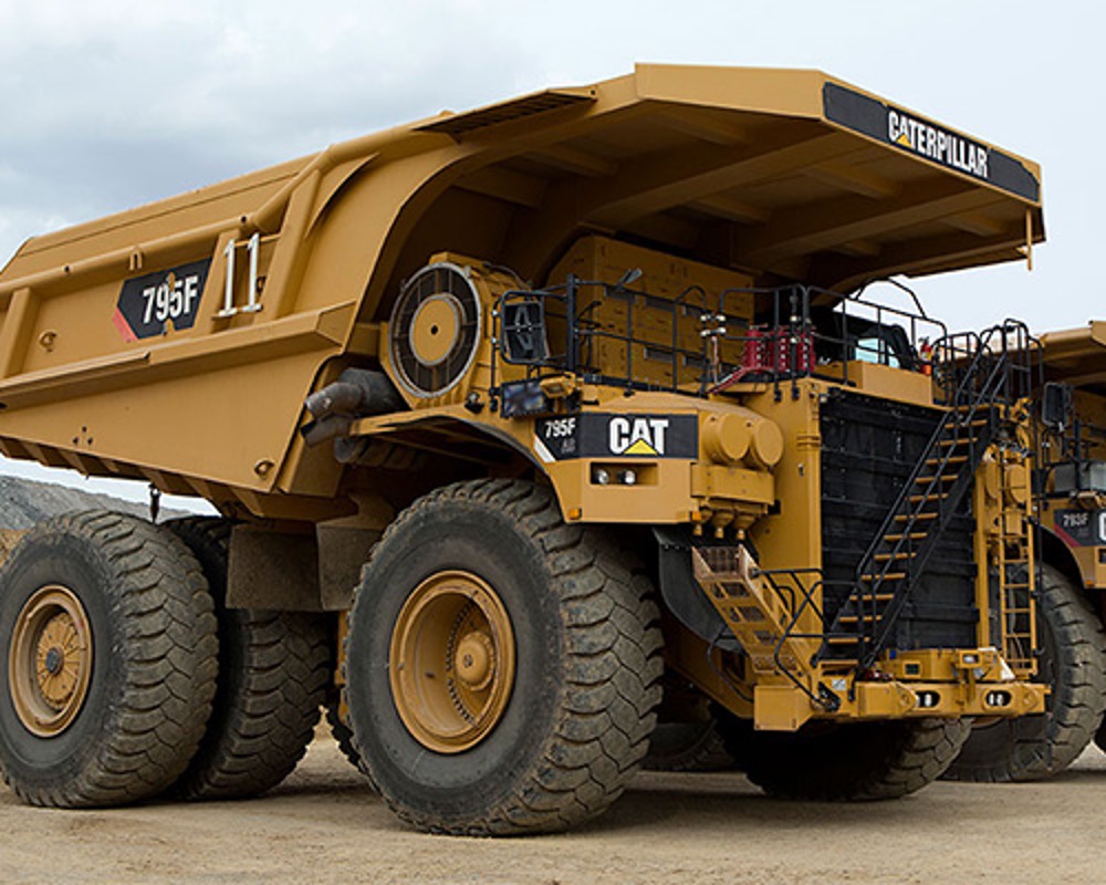Mining dump truck treated as subsystem; engine, hydraulics, driveline reported independently.