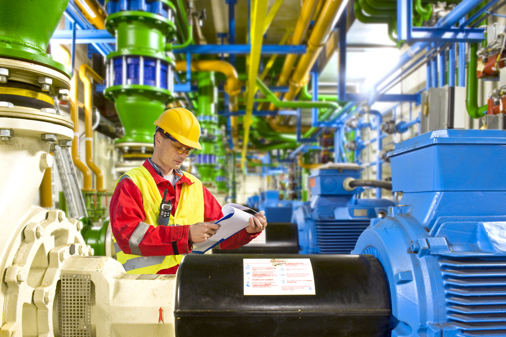 Figure 3: Technician performing visual inspection on motor-pump groups.