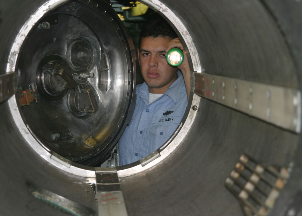 Figure 4: Inspector evaluating the tank.